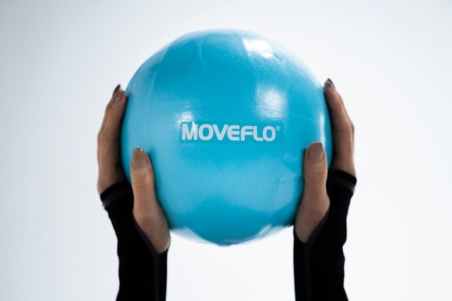 Pilates soft ball in hands