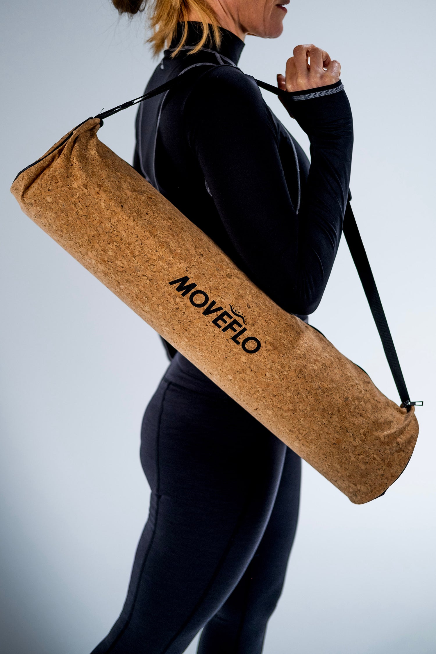 pilates mat in bag being carried on shoulder